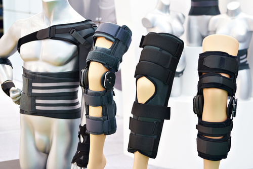 Brace on knee joint with sleeve made of neoprene in store